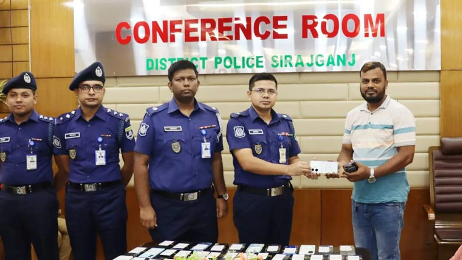 Sirajganj Police Return 53 Recovered Missing Mobile Phones to Owners